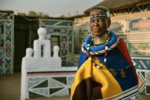 Esther Mahlangu in front of her house in Middelburg, province of Mpumalanga, South Africa, 2016. Photo courtesy of BMW