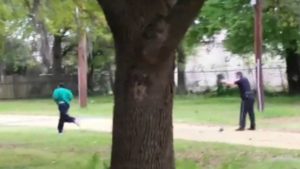 A screenshot of police video showing Walter Scott running from police moments before he was shot and killed. 