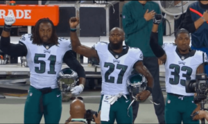 Eagles players Steven Means, Malcolm Jenkins and Ron Brooks protest the national anthem (Facebook)