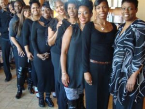 Cynthia Johnson (center) with D'Lor Salon and Spa staff.