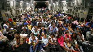 The C-17 Globemaster from McChord Air Force Base airlifts Haitian evacuees to Orlando, Florida following deadly earthquake in 2010. Photo by Joshua Trujillo/AP.