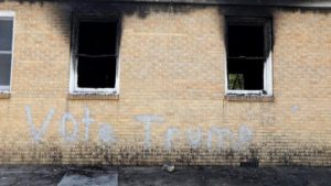 Image of a burned out, vandalized Hopewell Missionary Baptist Church. Photo by Rogelio V. Solis/AP Photo