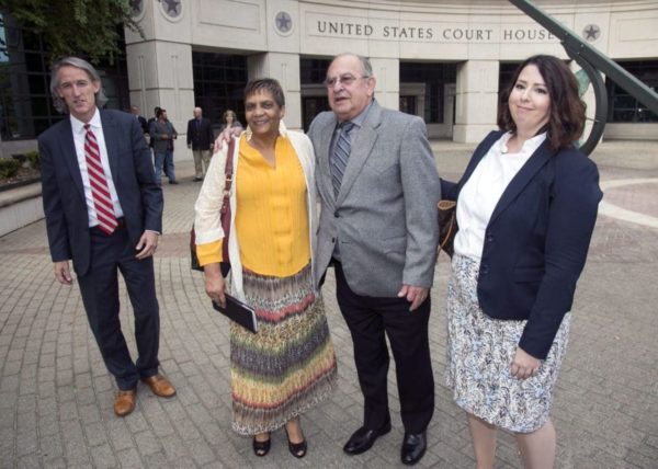 Louis Ackal (center) with NAACP Pres. of New Iberia Geri Brown (second from left) and paralegal Brandi North following Friday's not guilty verdict. Photo by Josh Collier.