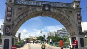 The Independence Arch on Chamberlain Bridge in Bridgetown bears the country's coat of arms, Broken Trident, national flower and pledge, as well as a dolphin and pelican