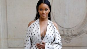 Barbadian singer Rihanna poses before the Christian Dior 2017 Spring/Summer ready-to-wear collection fashion show, on September 30, 2016 in ParisImage copyrightPATRICK KOVARIK/AFP/GETTY IMAGES Image caption Robyn Fenty, better known by her middle name of Rihanna, or Ri-Ri for short, was born and bred on the island