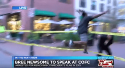 BLM Protester Leaps Across Police Tape to Snatch Confederate Flag from Counter-Protester