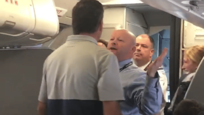 American Flight Attendant Taunts Passenger Defending Woman Whose Stroller Was Snatched: 'Hit me'