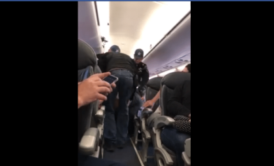 United Airlines Forcibly Removes Passenger from Overbooked Flight When He Refuses to Leave Seat Â 