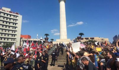 White Supremacists Clash with Opposing Protesters Over Removal of Confederate Monuments