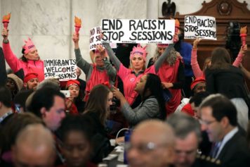 DOJ Actually Seeking Jail Time for Protester Who Laughed at Jeff Sessions' Confirmation Hearing