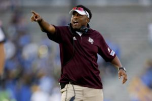 Kevin Sumlin gestures during an NCAA college football game