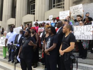 Activists gather outside the St. Louis courthouse 