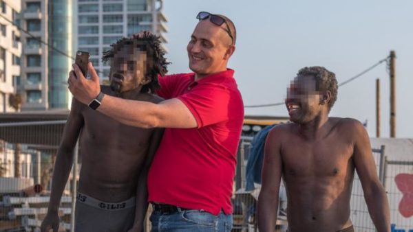 Outrage Ensues After Photos Of Migrants Being Humiliated