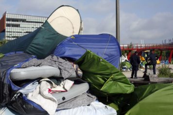 Paris Police Clear out Migrant Camp at Center of Debate