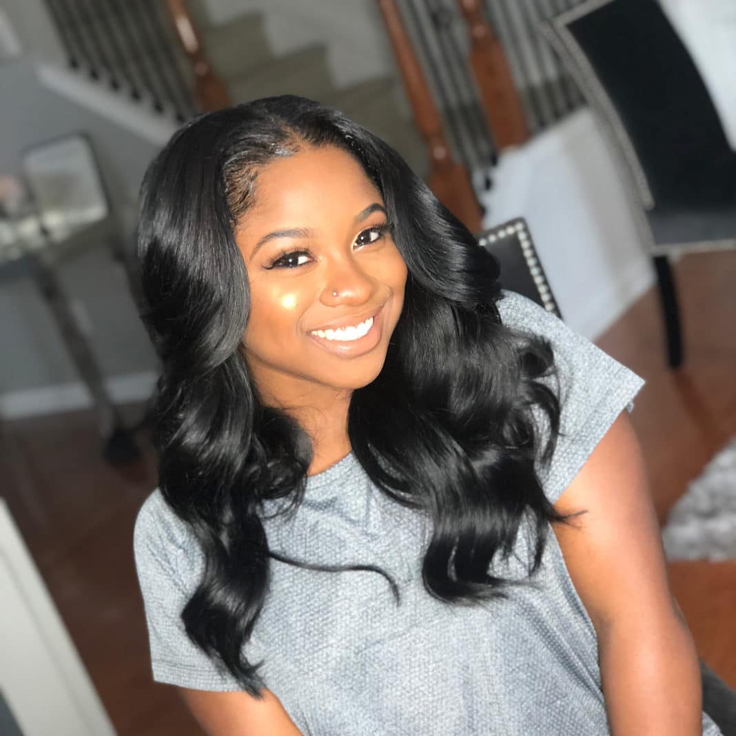 Reginae Carters Innocent Post Gets Derailed By Fan Criticizing Her Edges 7395