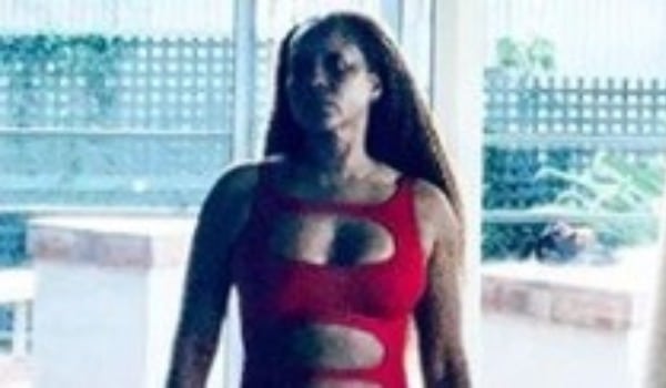 Erykah Badu Stuns Fans and Celebrities with Racy Red Swimsuit