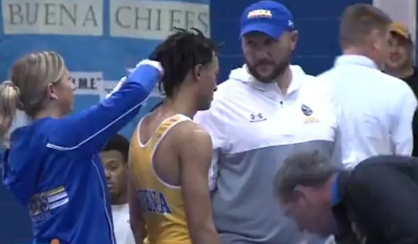 A high school wrestler from New Jersey was forced to cut his dreadlocks by a white referee before a match.