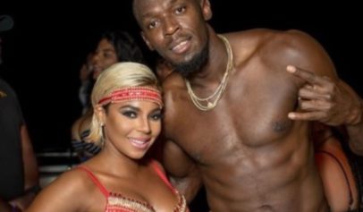 Ashanti Poses In Sexy Swimsuit With a Shirtless Usain Bolt and Fans Go Crazy