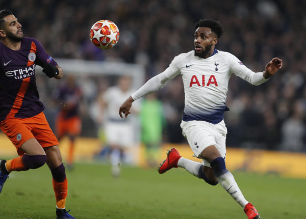 Manchester City's Riyad Mahrez, left, challenges for the ball with Tottenham's Danny Rose during the Champions League