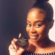 Founder poses with charcoal product