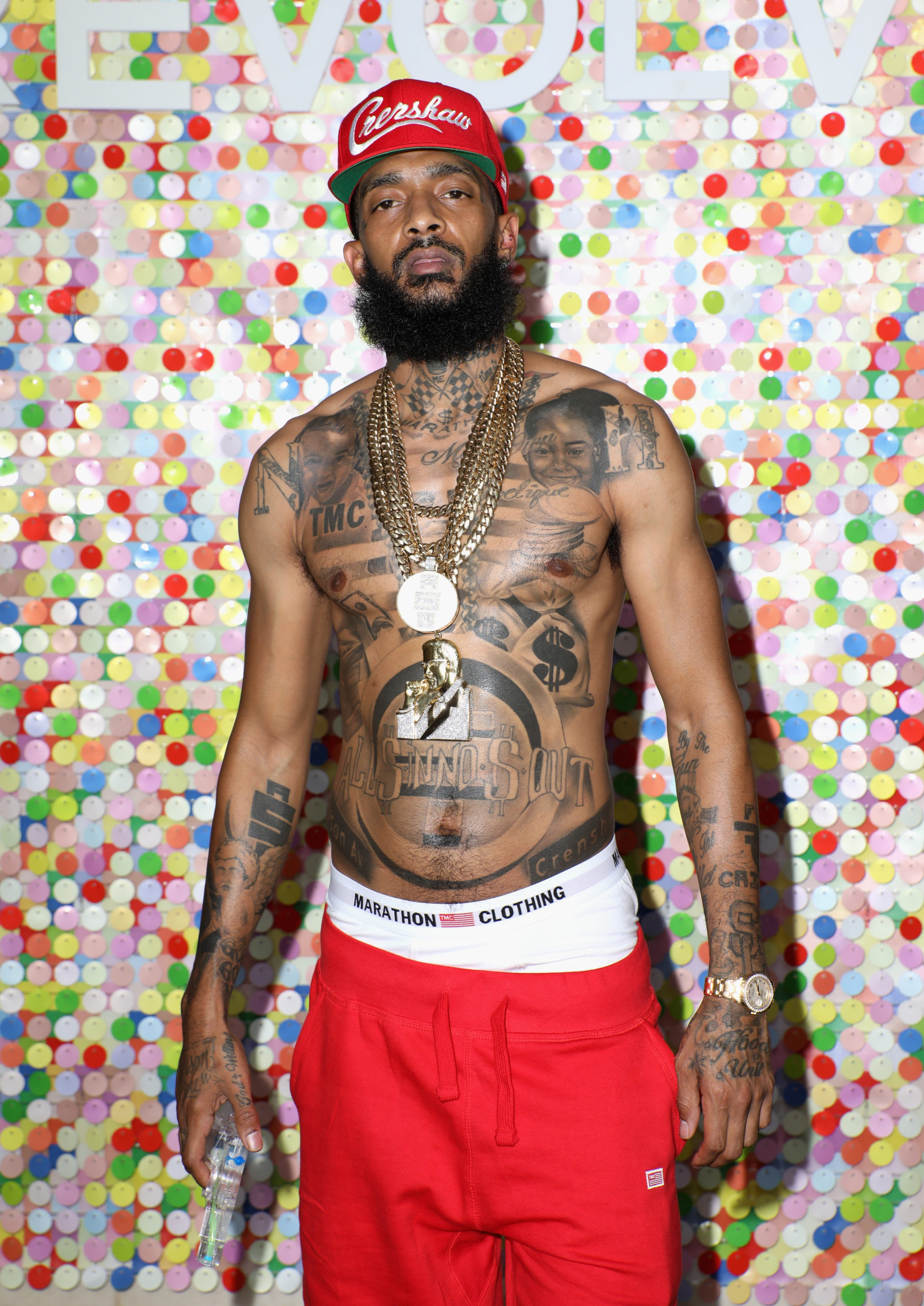 Happy Birthday Nipsey Details Behind Some Of The Late Rappers Iconic Tattoos And Murals