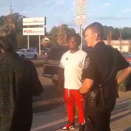 Police stop man in red pants