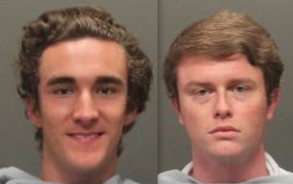 2 Arizona students pose for mugshot