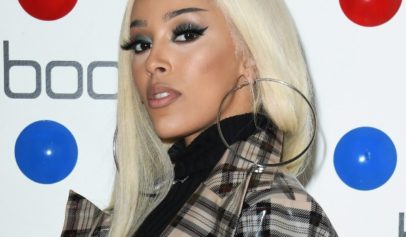 Stupid as F--k': Doja Cat Fires Back After She's Accused of Lightening Her Skin