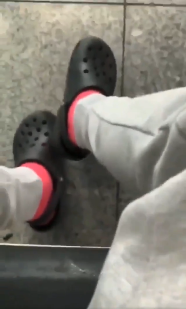 black crocs on feet