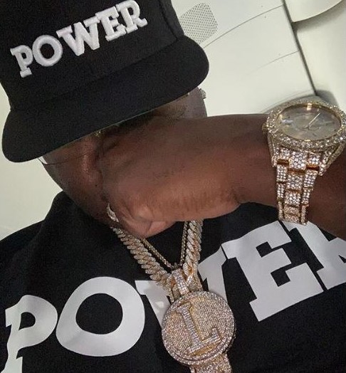 50 Cent in50 Cent in Power attire and diamonds