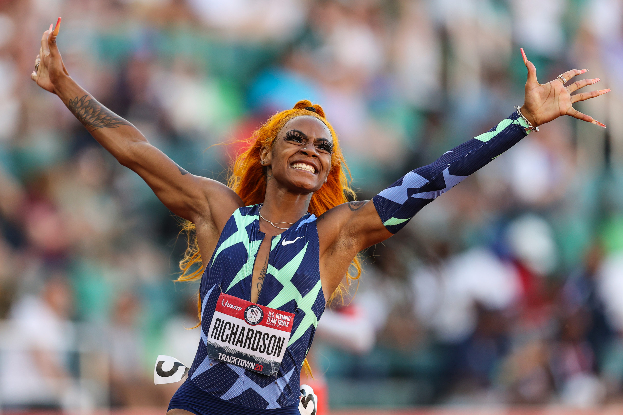 Sprinter Sha'Carri Richardson Celebrates Her 100 Meters Win with Warm