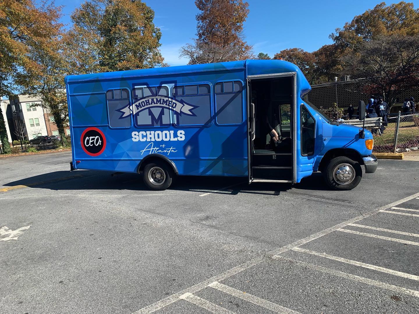 Group of Black Atlanta Businessmen Gift Local School’s Basketball Team with New Bus