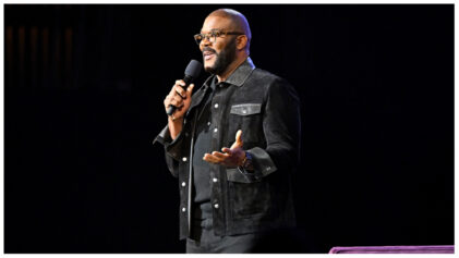 ATLANTA, GEORGIA - DECEMBER 02: Tyler Perry speaks onstage during the Michelle Obama: The Light We Carry Tour at The Fox Theatre on December 02, 2022 in Atlanta, Georgia. (Photo by Derek White/Getty Images for ABA)