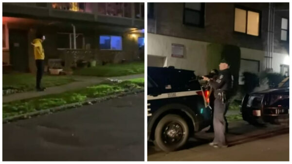 Seattle police point gun at unarmed man, bystanders step in