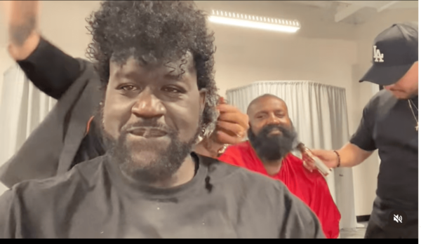 Shaquille O'Neal debuts new 'Jerri Curl' look as his singing skills fall flat in new video.