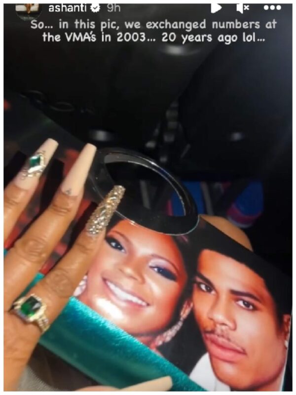 Ashanti rocks Nelly's face on her purse at the 2023 VMAs after he confirms their rekindled romance. 