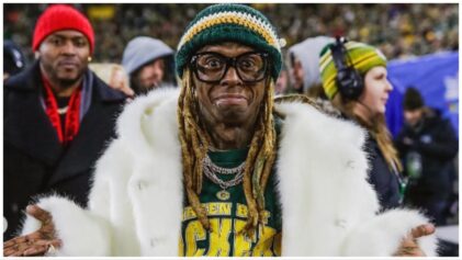 Lil Wayne gets roasted after he runs with the Green Bay Packers on to the field.