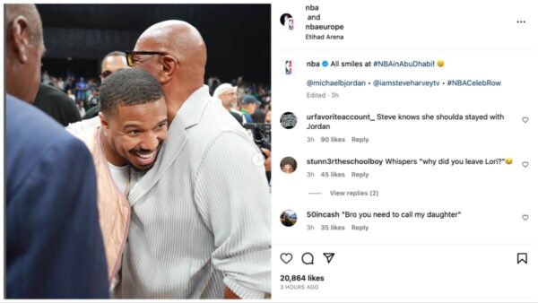 Steve Harvey embraces his stepdaughter's ex, Michael B. Jordan, at a recent basketball game.