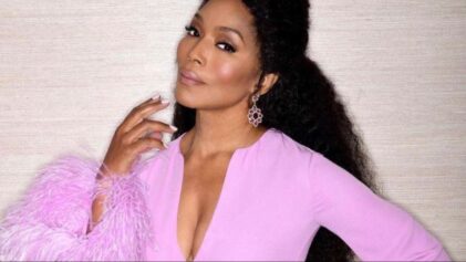 Fans say Angela Bassett 'left no crumbs' as she makes her runway debut.