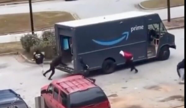 Group of People Steal From Amazon Truck