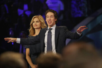 HOUSTON, TX - SEPTEMBER 03: Joel Osteen, the pastor of Lakewood Church, stands with his wife, Victoria Osteen, as he conducts a service at his church as the city starts the process of rebuilding after severe flooding during Hurricane and Tropical Storm Harvey on September 3, 2017 in Houston, Texas. Pastor Osteen drew criticism after initially not opening the doors of his church to victims of Hurricane Harvey. Harvey, which made landfall north of Corpus Christi on August 25, dumped around 50 inches of rain in and around areas of Houston and Southeast Texas. (Photo by Joe Raedle/Getty Images)