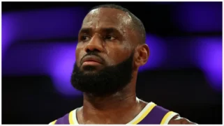 Female Nuggets fan heckles LeBron James calling him a "crybaby."