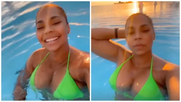 Ashanti stun in all green bikini while on vacation.