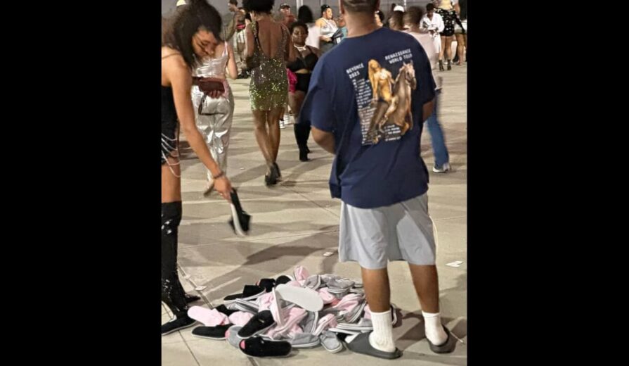Man Sells Flip-Flops Outside of Beyoncé's concert.
