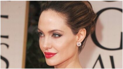 In 2012, actress Angelina Jolie arrives at the 69th Annual Golden Globe Awards, where hre then husband, Brad Pitt, was nominated for Best Performance By An Actor In A Motion Picture – Drama.