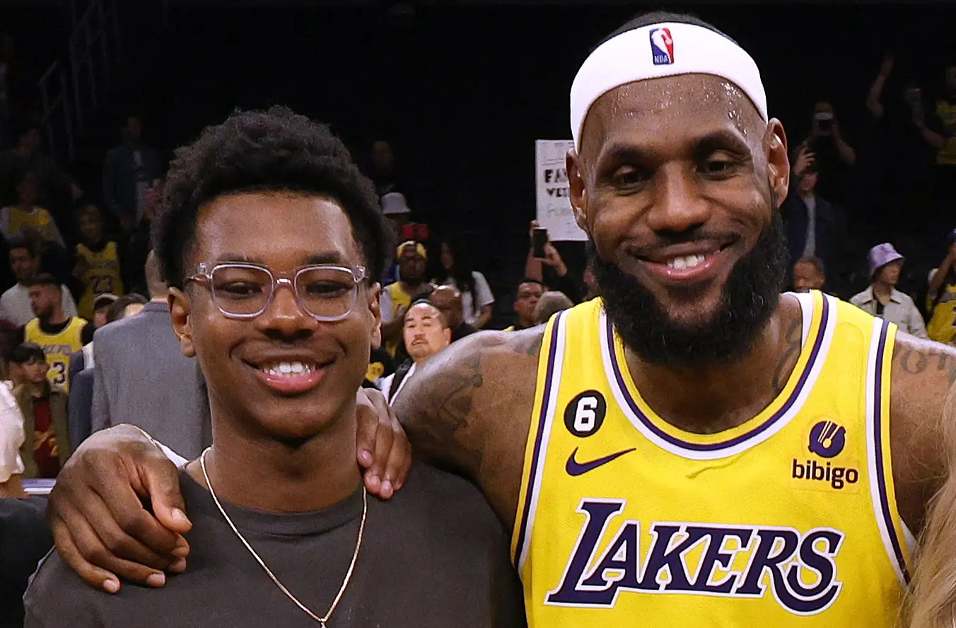 LOS ANGELES, CALIFORNIA - FEBRUARY 7: LeBron James #6 of the Los Angeles Lakers poses for a photo with his family at the end of the game, (L-R) Bronny James, Bryce James, Zhuri James Savannah James and Gloria James pass Kareem Abdul-Jabbar to become the NBA's all-time leading scorer, surpassing Abdul-Jabbar's career score of 38,387 points against the Oklahoma City Thunder at Crypto.com Arena on February 7, 2023 in Los Angeles, California. (Photo by Harry How/Getty Images)