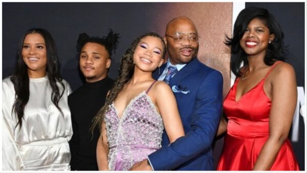 (L-R) Storm Reid poses on the red carpet with her sister, Iman, brother Josh, their father Rodney, Reid and sister, Paris. 