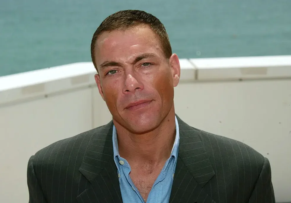 CANNES, FRANCE - MAY 18: Actor Jean-Claude Van Damme poses during a photocall on the roof at the Noga Hilton during 56th International Cannes Film Festival 2003 on May 18, 2003 in Cannes, France. (Photo by Evan Agostini/Getty Images)
