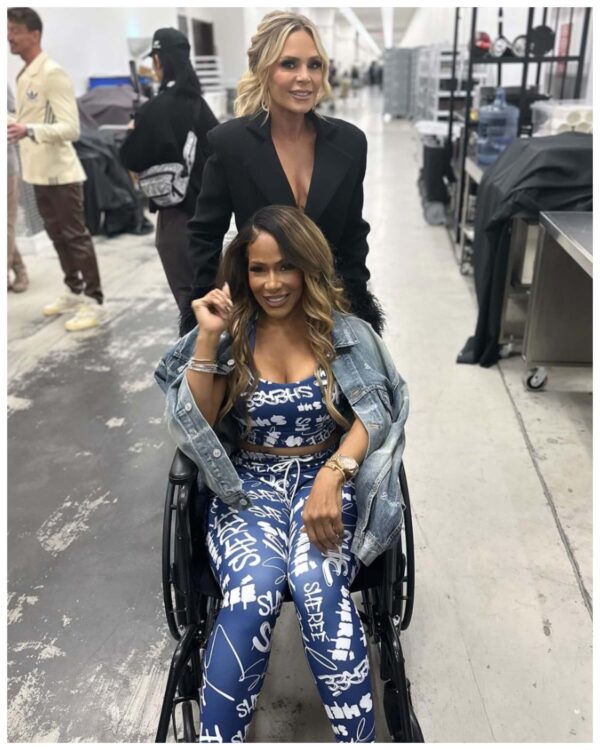 Shereé Whitfield is all smiles after leaving BravoCon in a wheelchair as fans express concern. 