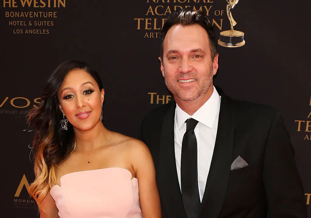 LOS ANGELES, CA - MAY 01: Actress Tamera Mowry-Housley (L) and her Husband Adam Housley (R) attend the 2016 Daytime Emmy Awards at The Westin Bonaventure Hotel on May 1, 2016 in Los Angeles, California. (Photo by Paul Archuleta/FilmMagic)
